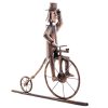 Figura in rame per la grondaia, cavaliere del penny-farthing, bicicletta storica